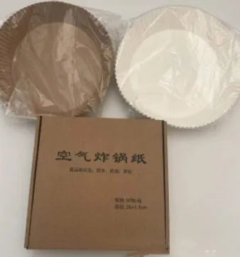 Round disposable paper liners for air fryers with 4.5cm high edges in white parchment colour