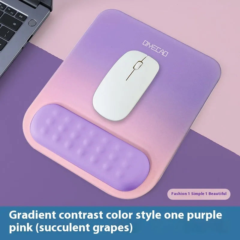 Ergonomic mouse pad with raised wrist support in a choice of contrast colour patterns on a desk.