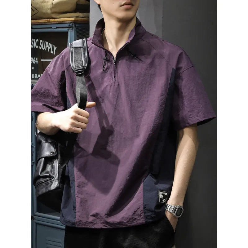 Brown men's half-zip stand collar short-sleeve shirt on a hanger, showing loose fit and ice silk fabric texture.