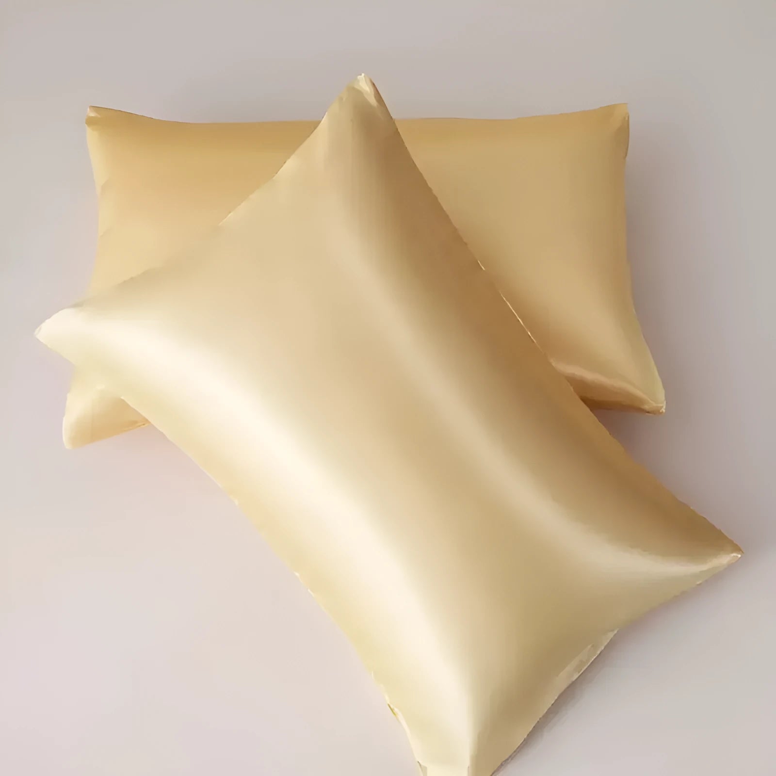 Satin polyester pillowcase pair in solid colour with plain weave texture