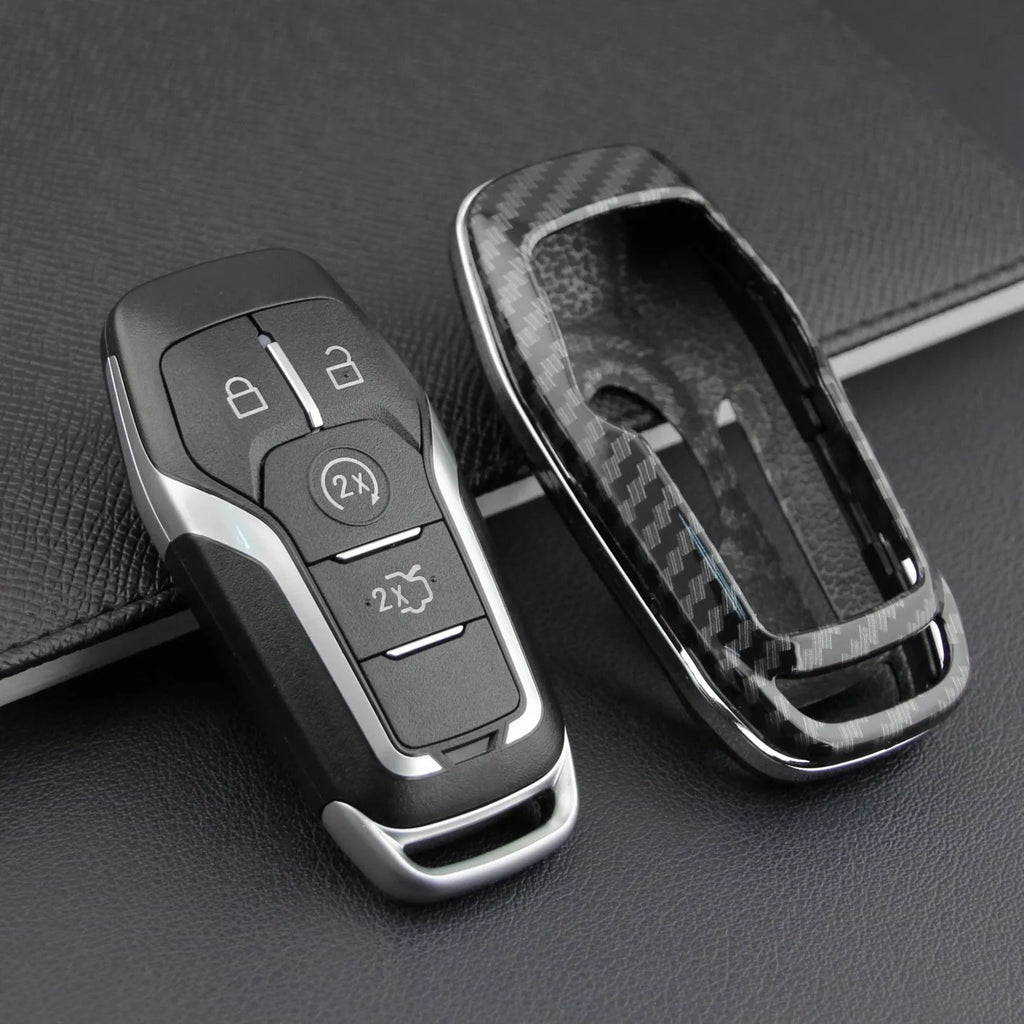 Black plastic protective shell for a car key fob with a buckle clip attachment.