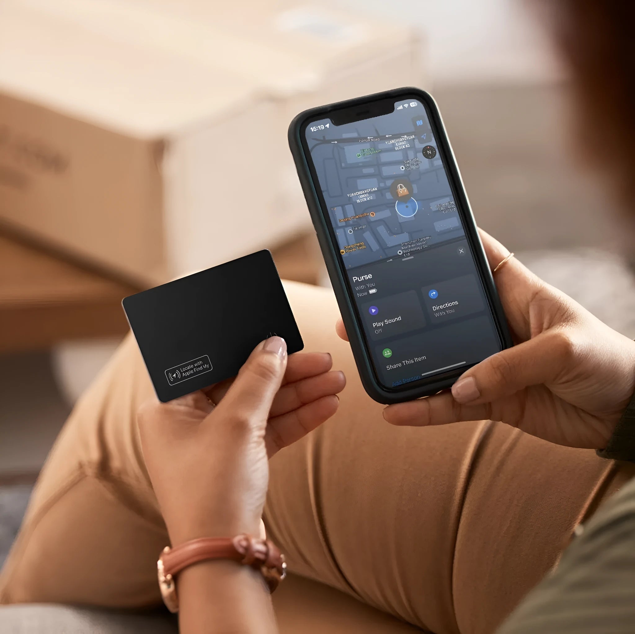 Black ultra-thin anti-loss tracking card for Apple devices with wireless charging, shown next to a credit card for size comparison.