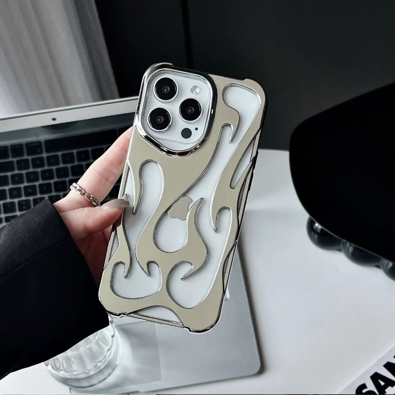 Electroplating hollow flame pattern TPU phone case for Apple iPhone in gold colour.