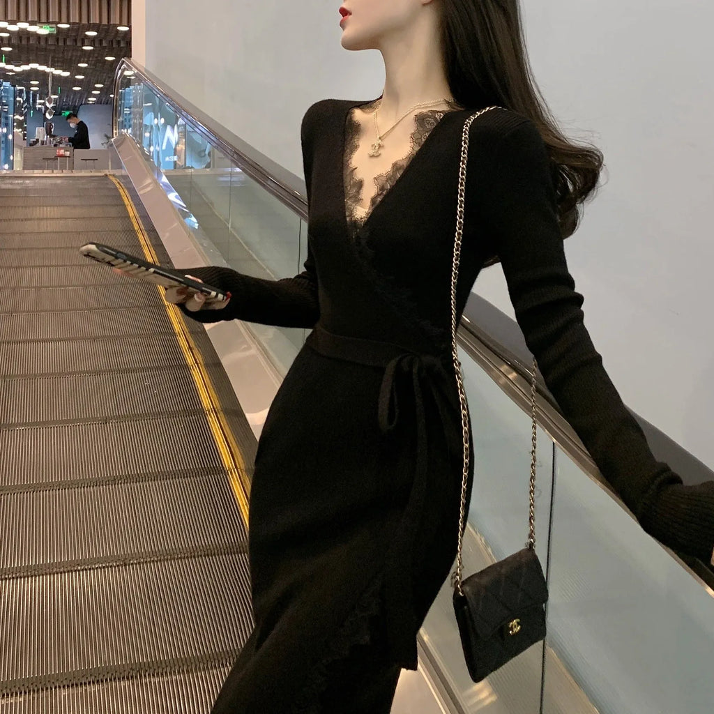 Black women's slim fit woolen princess dress skirt on a model.