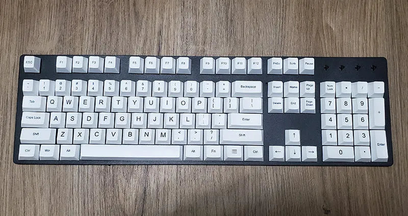 Set of PBT keyboard keycaps with Japanese, Russian, and Korean thermal sublimation legends, showing a five-sided spacebar.