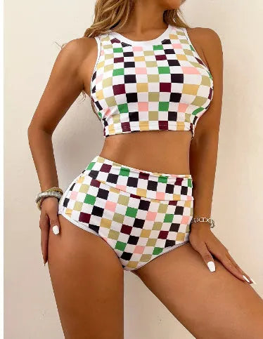 Women's black and white plaid racing one-piece swimsuit with backless design and adjustable suspender straps.
