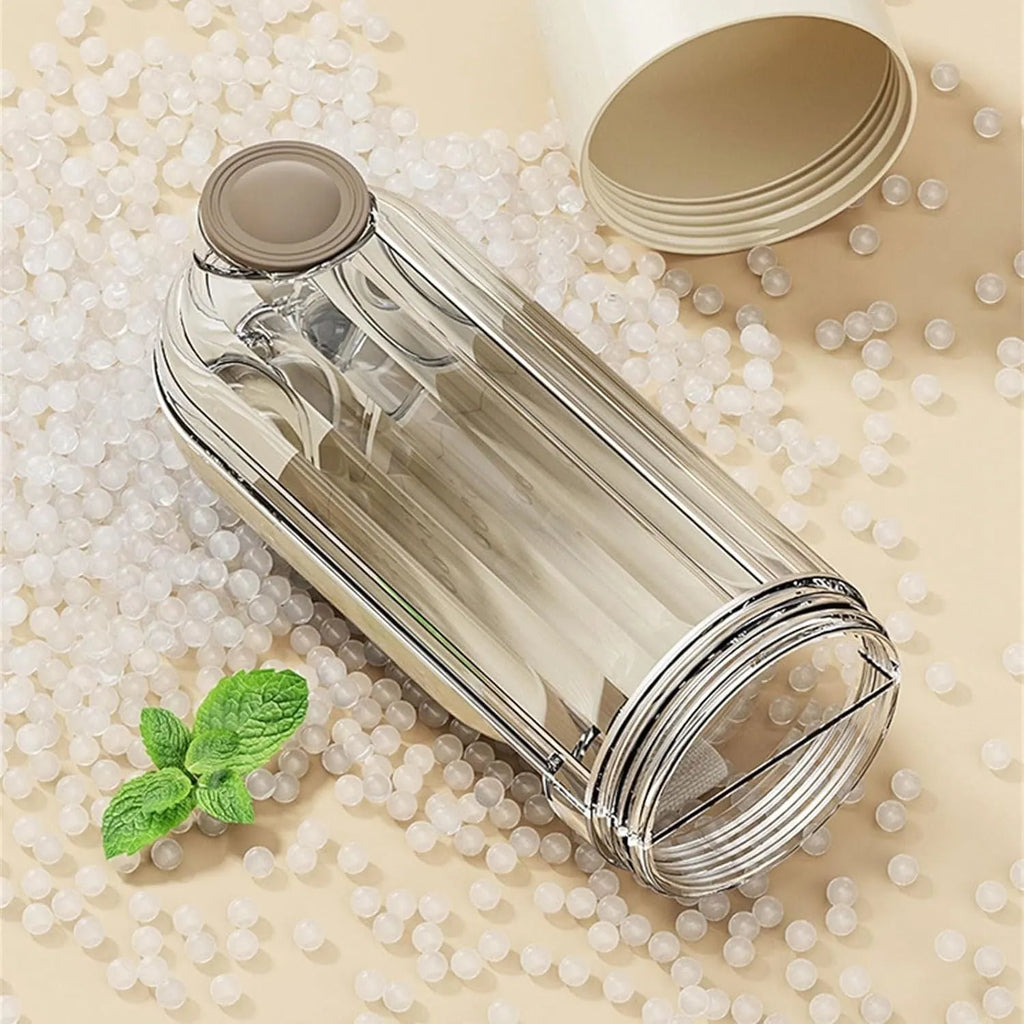 Beige dog water bottle with foldable silicone tray and integrated food dispenser base.