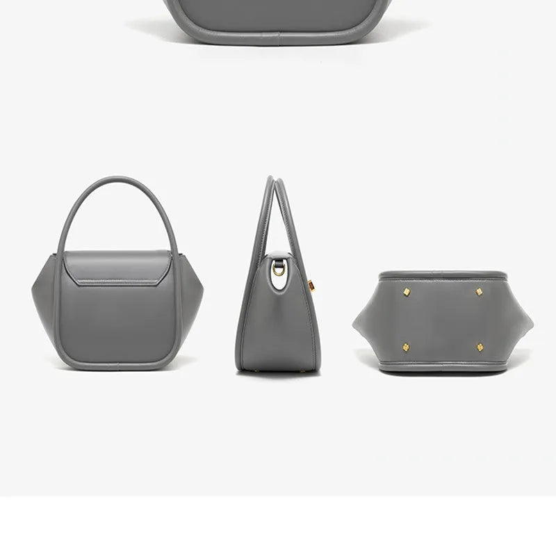 Women's cow leather wing tote bag with shoulder strap and latch closure in four colour options
