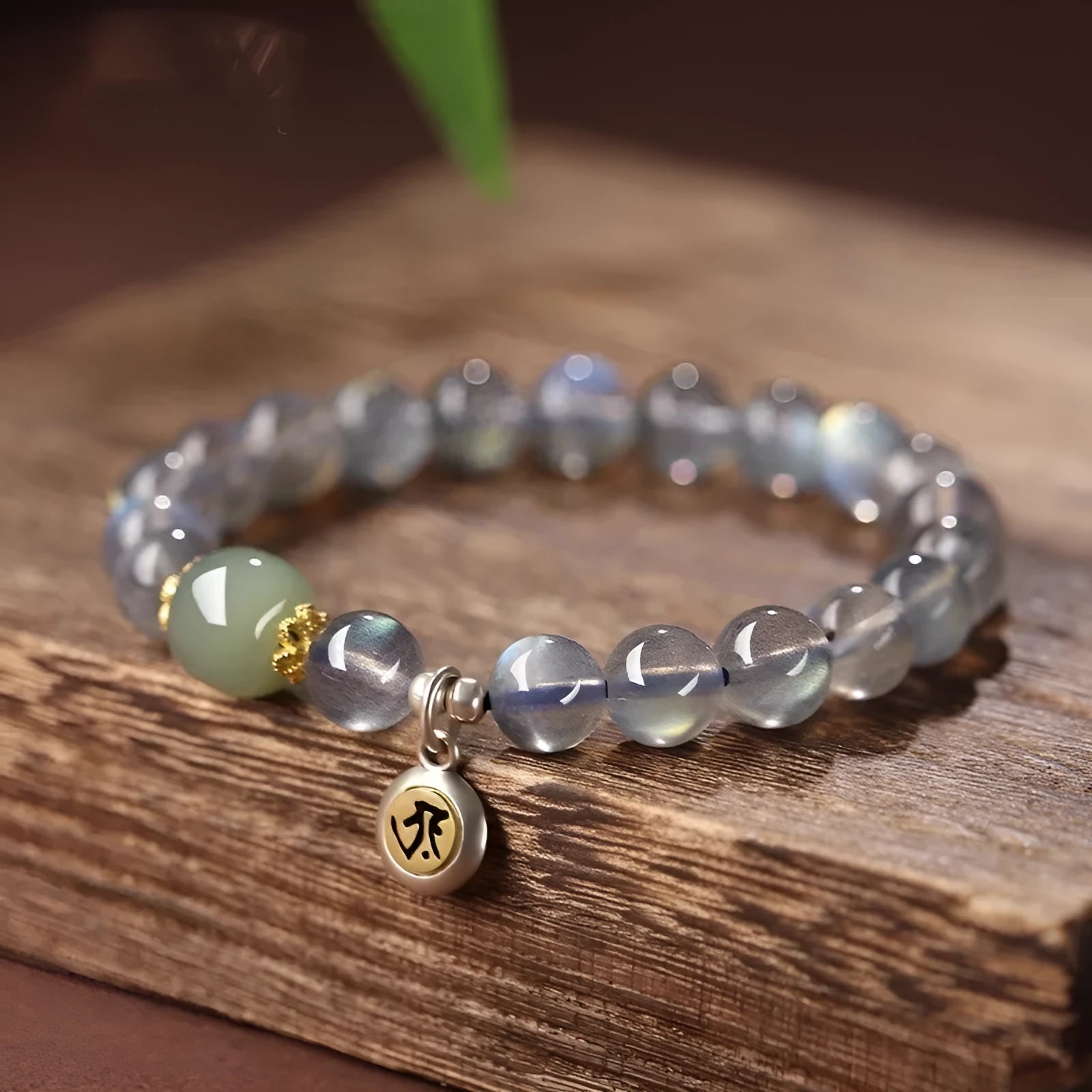 Moonstone birth Buddha beads bracelet with Thousand-Hand Kwan-yin mouse design and moonlight crystals