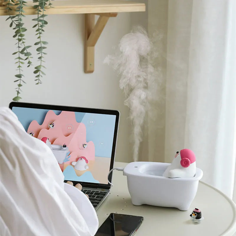 White USB air humidifier with 550ml water tank and dual mist controls for home aromatherapy