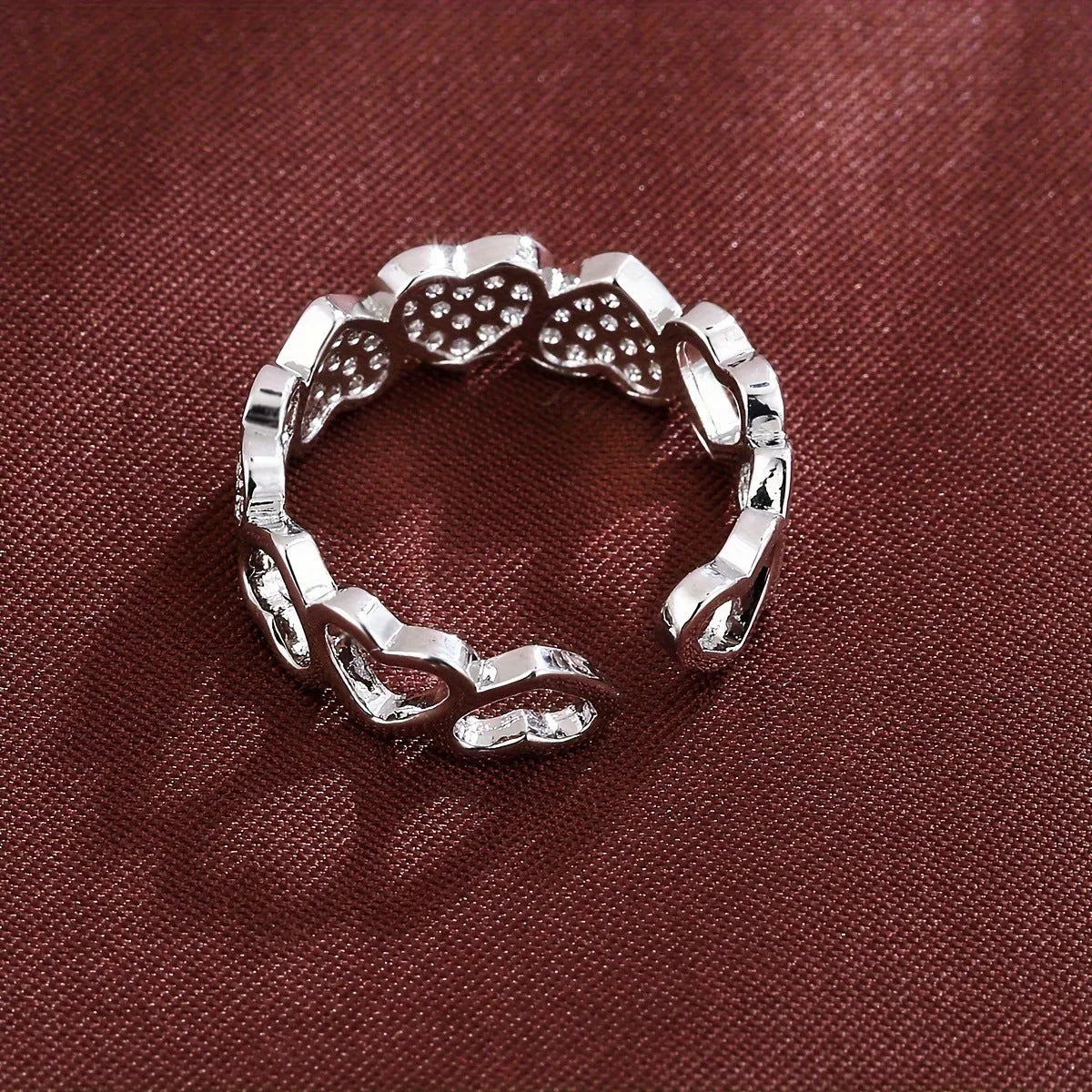 Adjustable opening copper couple's ring with love heart design in gold or silver colour