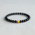 Black polished obsidian geometric bracelet with 10mm beads, Korean unisex style.