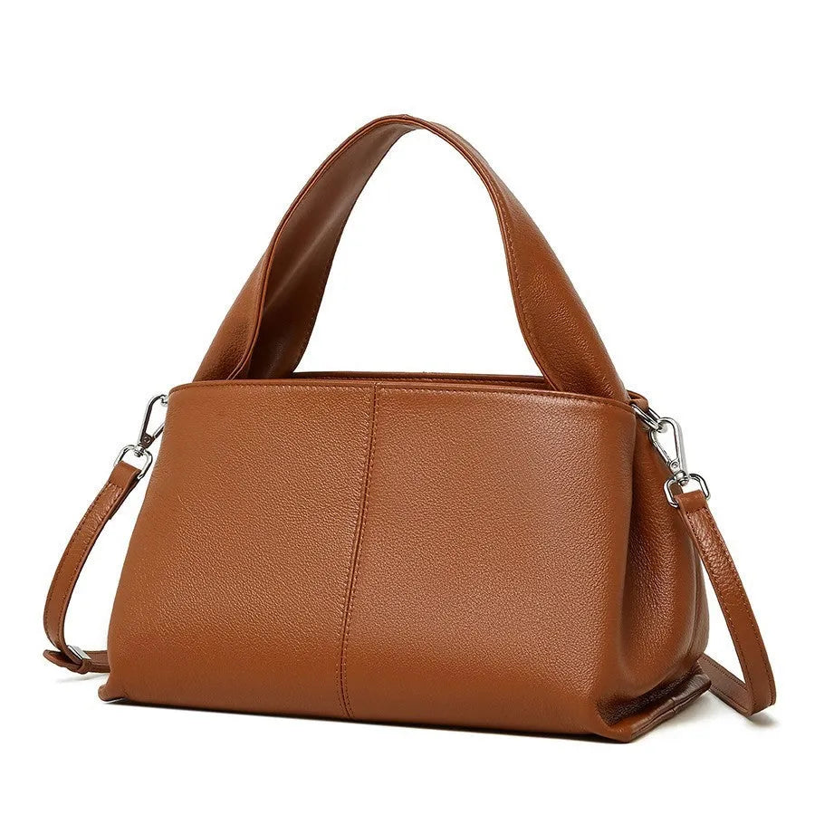 Genuine cowhide leather messenger bag in urban style with sandwich pocket and double straps.