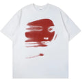 White loose-fit cotton T-shirt with short sleeves and a round neck on a hanger.