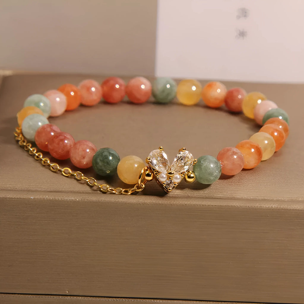Women's Fu Lu Shou crystal bracelet with a central V-shaped zircon detail on a clear band