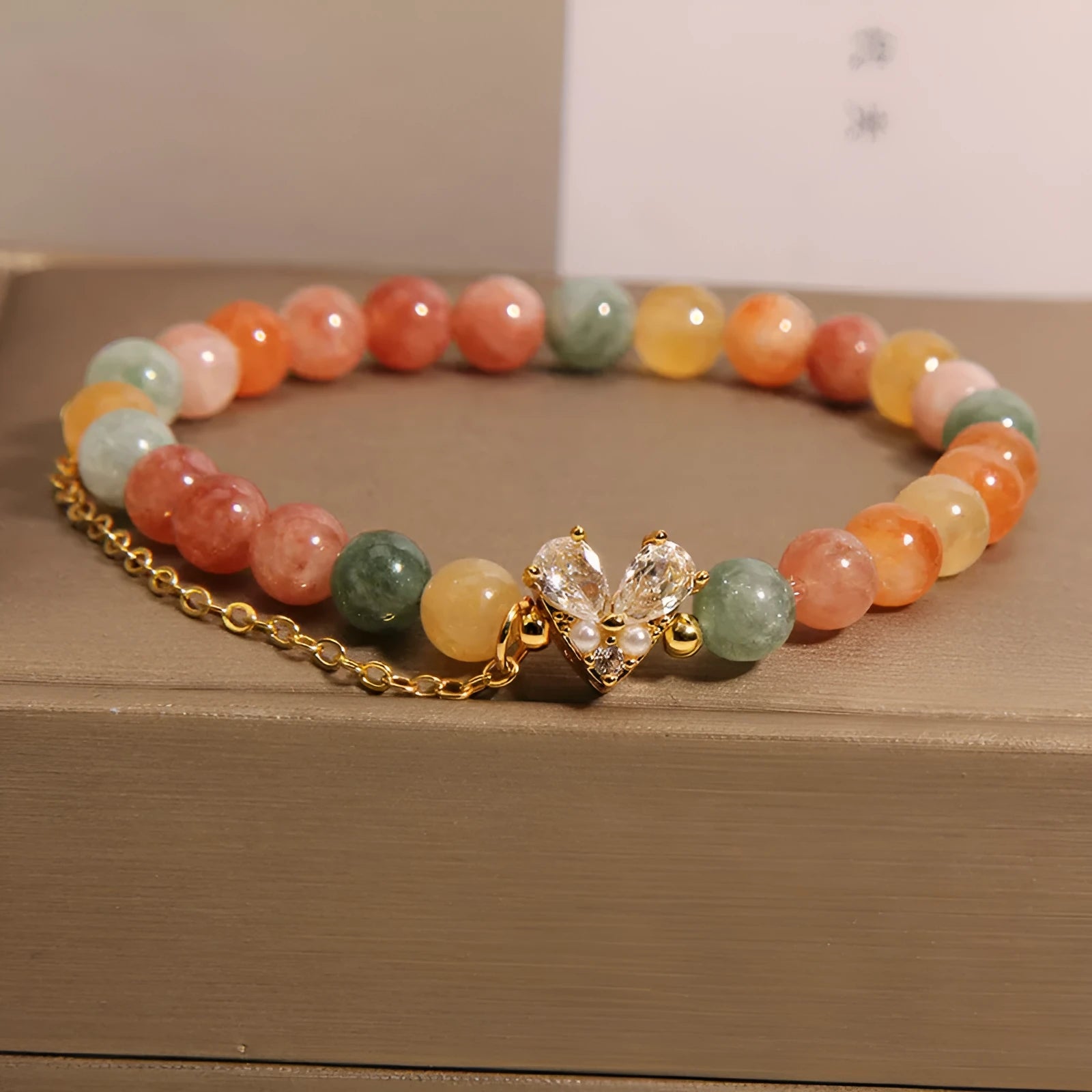 Women's Fu Lu Shou crystal bracelet with a central V-shaped zircon detail on a clear band