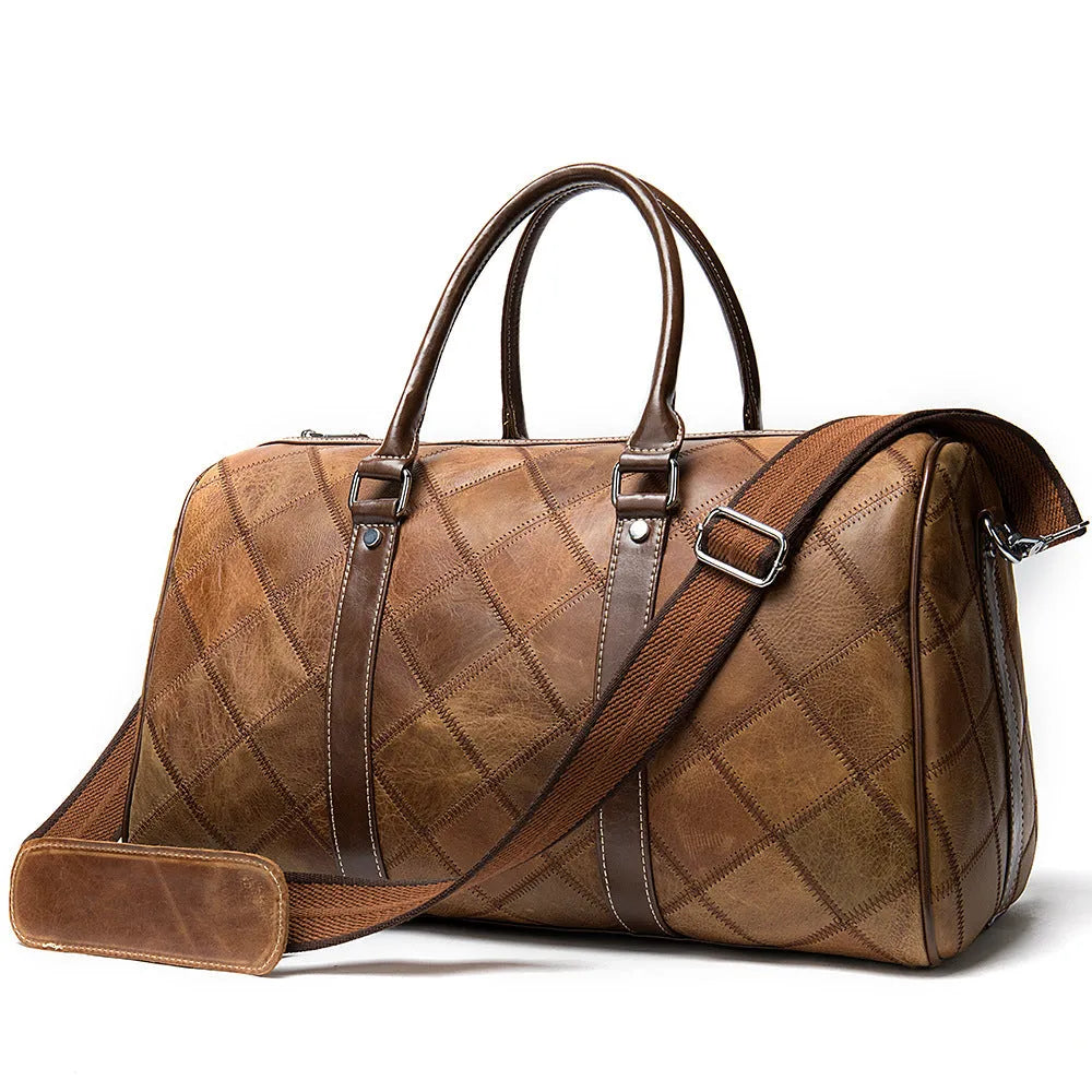 Vintage brown leather men's duffel bag with a single shoulder strap, shown open to reveal internal phone and ID pockets.