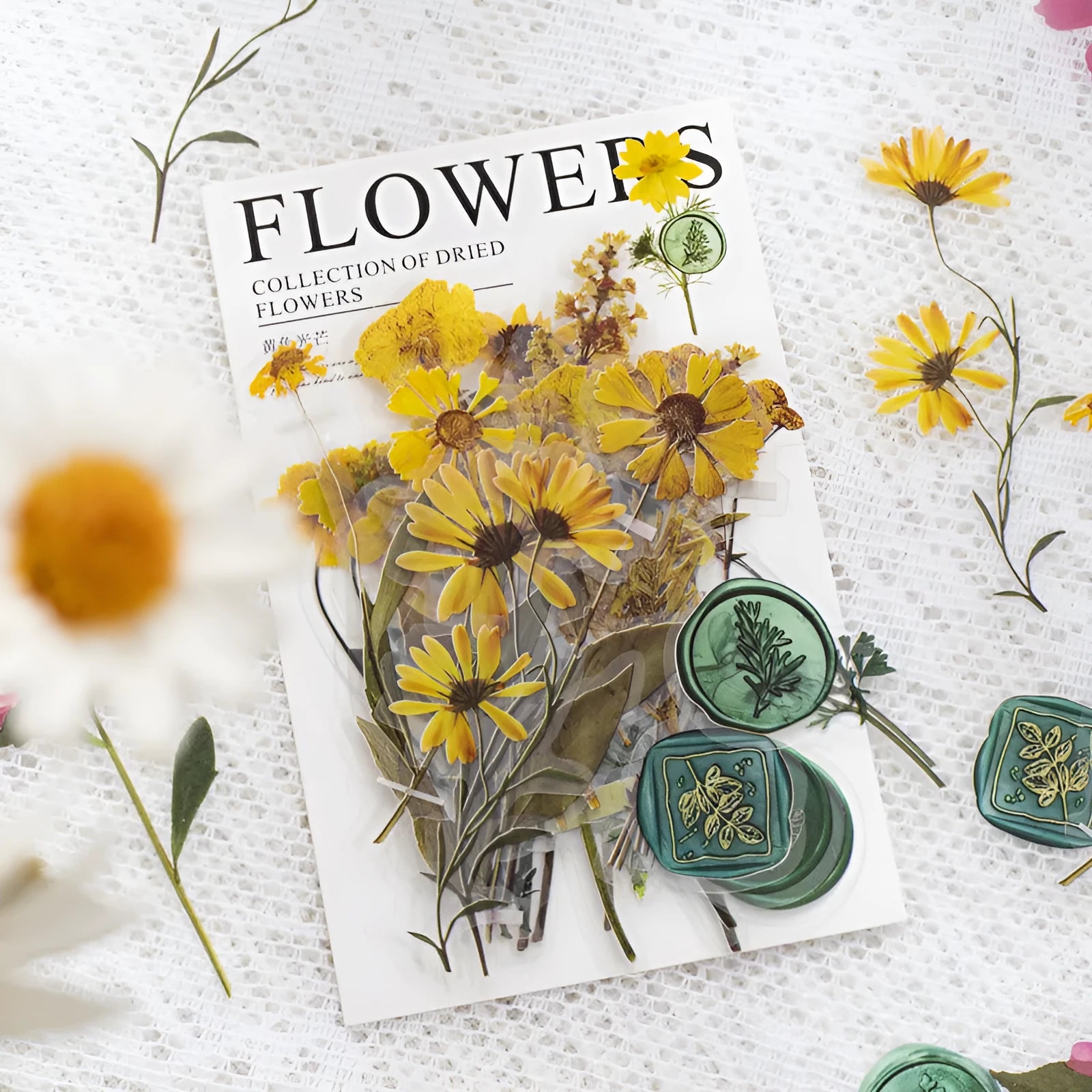 Set of 40 dried flower theme decorative stickers in eight colour styles including purple, blue, orange, and pink.