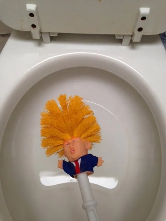 Yellow plastic Donald Trump novelty toilet brush with hanging handle, 40cm long