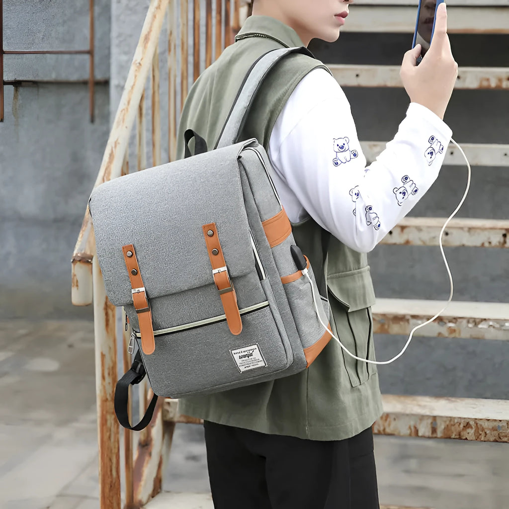 Three-piece business backpack in Oxford cloth, shown in wine red, with curved shoulder straps.