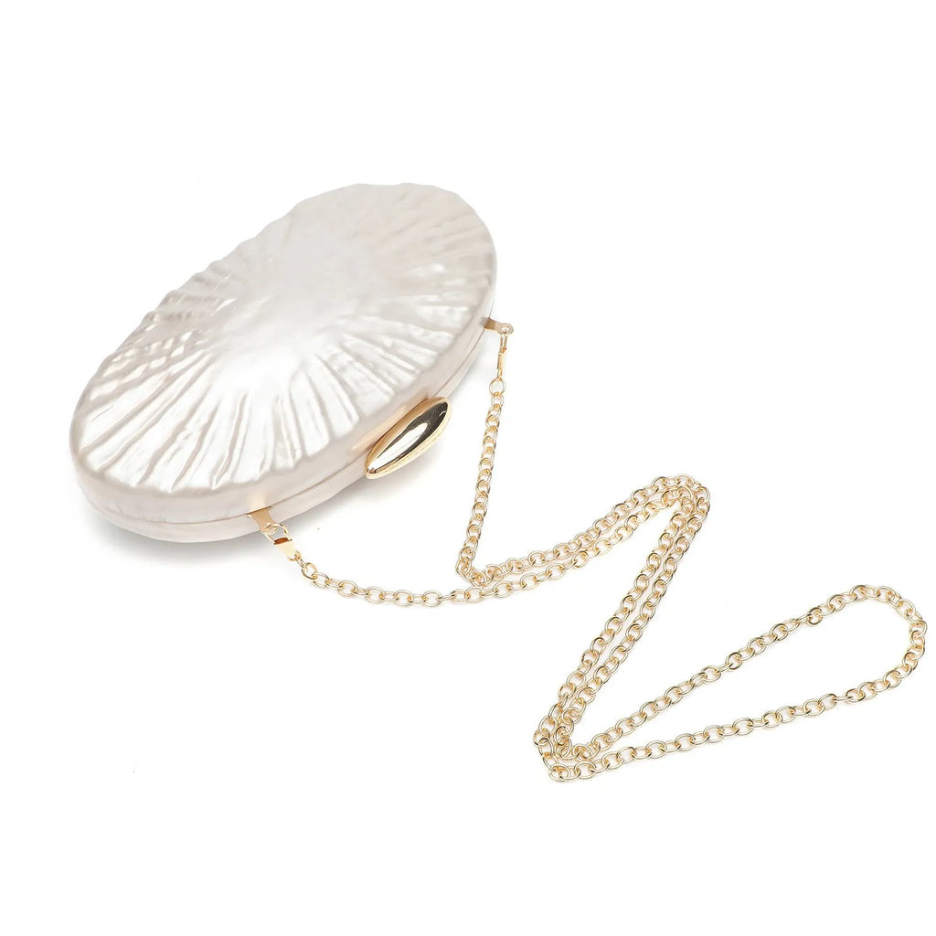 Retro oval one-shoulder crossbody bag in shell colour with hard acrylic shell and slit pocket
