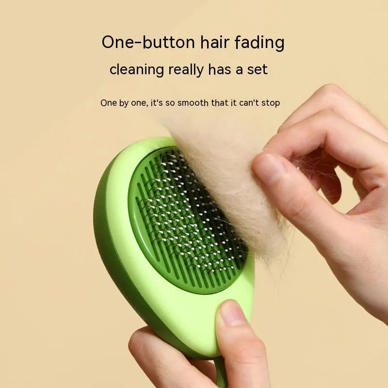 Avocado-shaped cat brush in avocado green with stainless steel needles