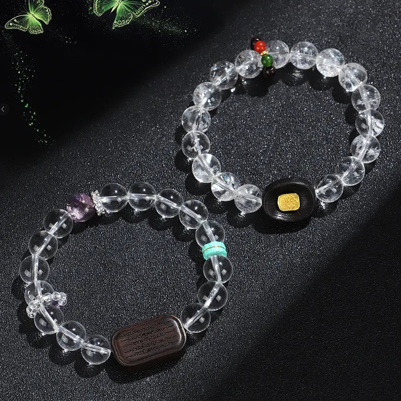 Handmade natural white crystal ebony bracelet with five warp design on wooden background