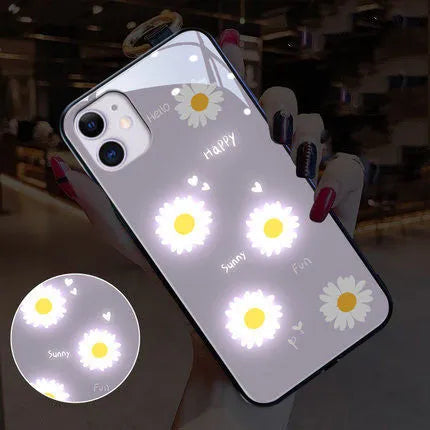 Apple iPhone case with voice-activated colour light showing painted daisy floral design
