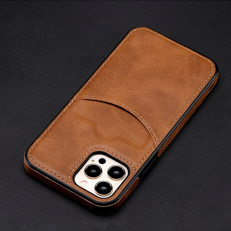 Dark blue PU leather protective case for iPhone mobile phones on a table.