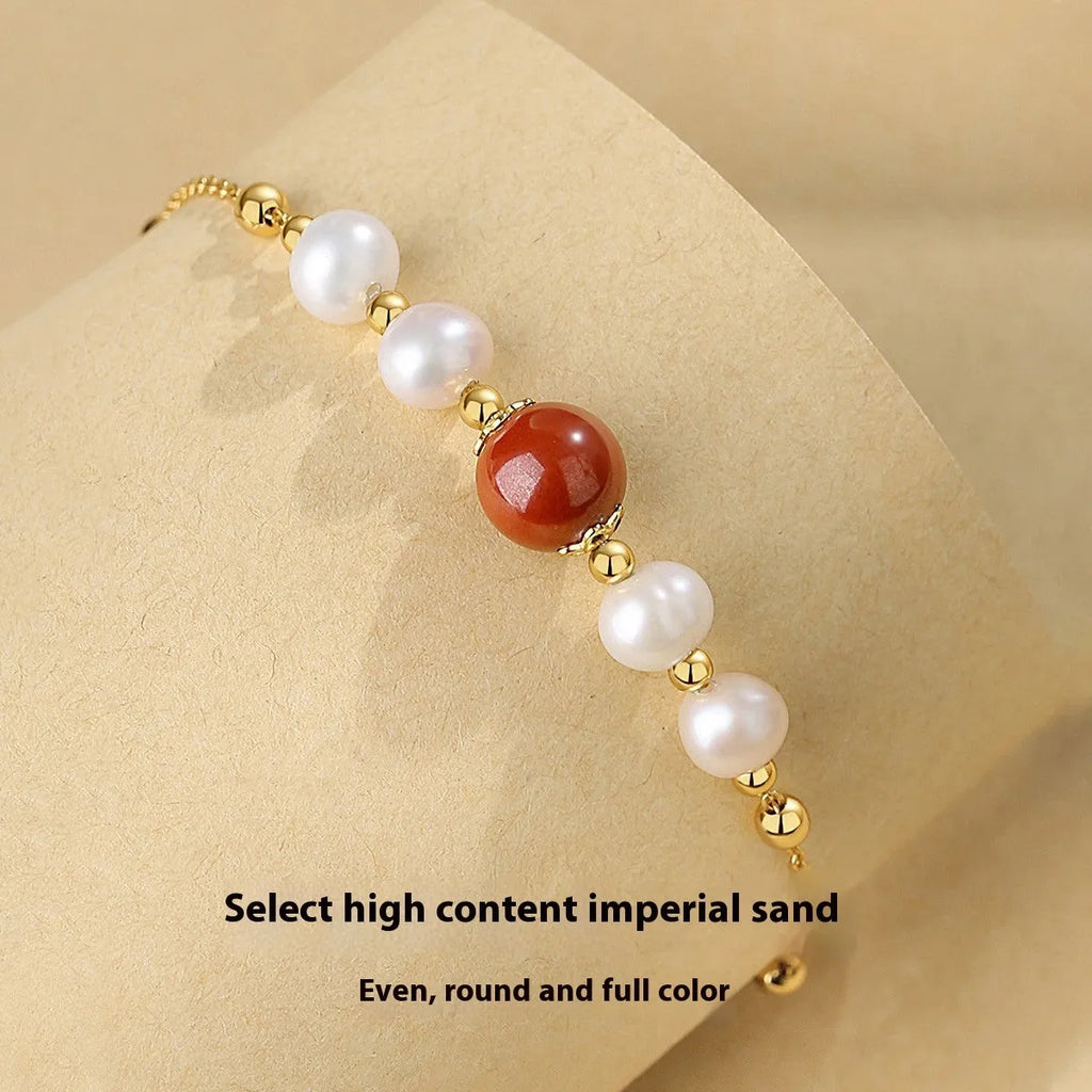 Yellow cinnabar charm on a silver 925 adjustable bracelet chain for women