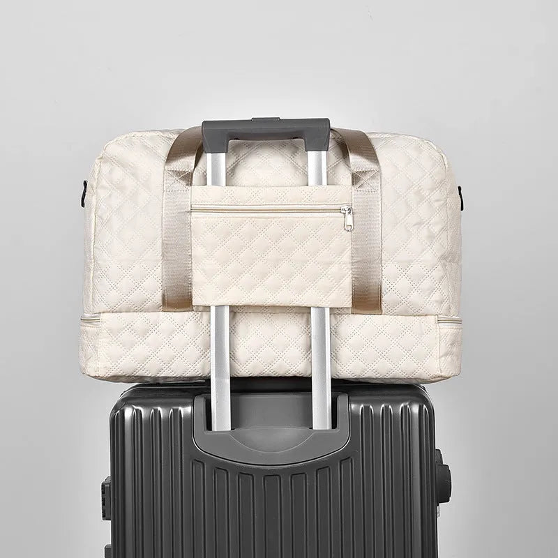 Large black Oxford cloth travel bag with a breathable lining, showing 36-55 litre capacity.