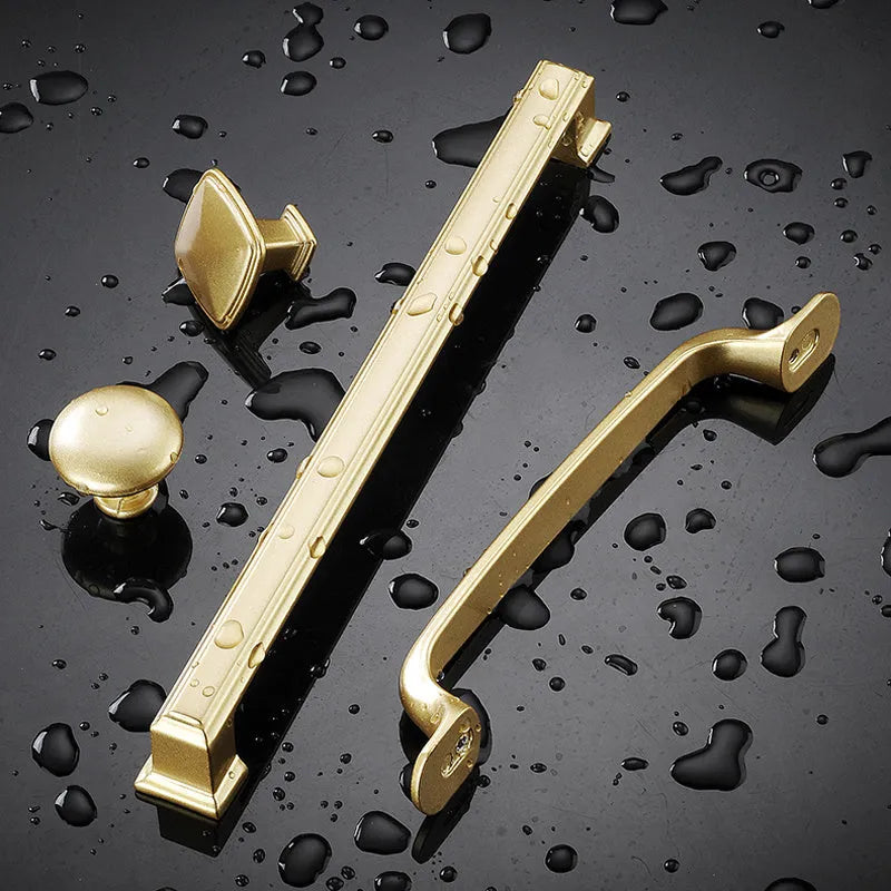 Gold aluminium T-shaped cabinet handle showing three hole distance size options