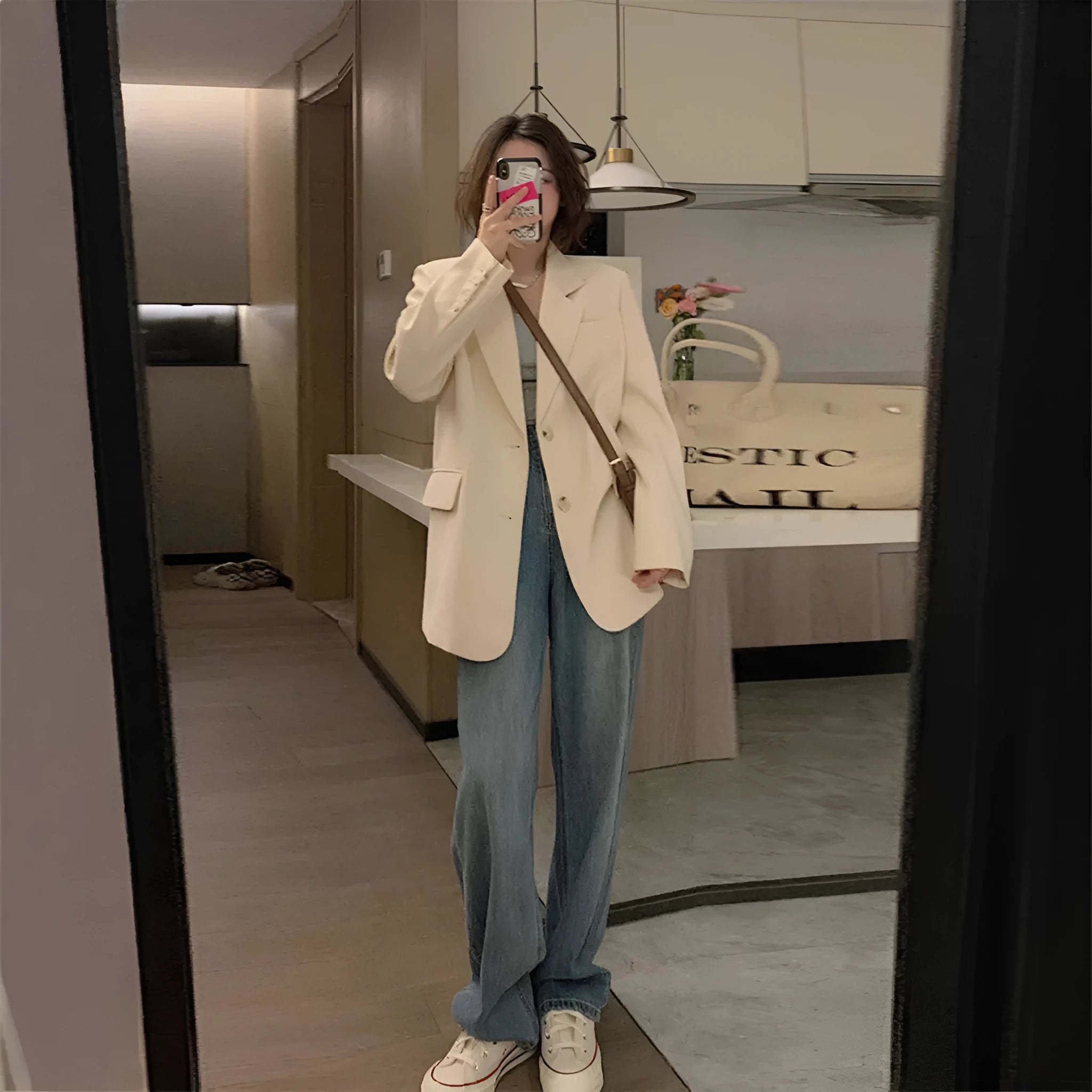 Korean style solid colour polyester suit jacket with long sleeves and a pocket on a mannequin.
