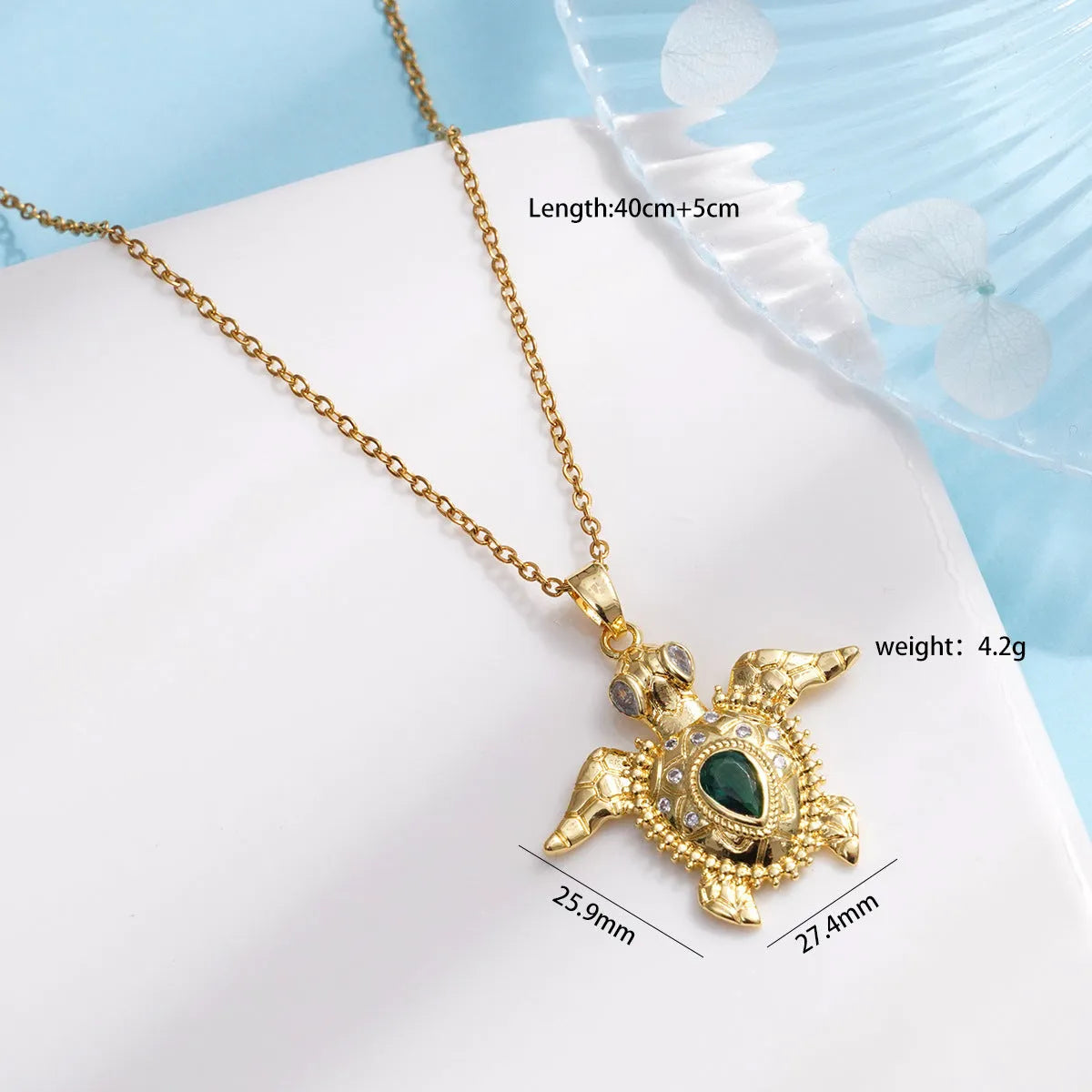 Gold-plated copper sea turtle pendant necklace with mixed gemstone inlay and zirconium encrustation on titanium steel chain