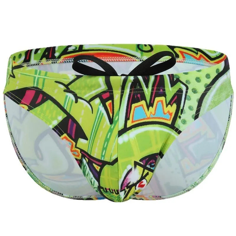 Men's printed polyester swim trunks in skull graphic design on a mannequin