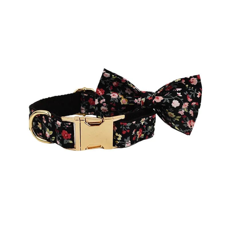 Four-piece pet accessory set showing dog collar, matching leash, decorative bow, and dog vest with cute printed lettering