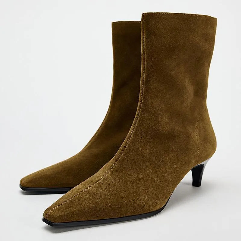 Women's brown square toe ankle boots with a side zipper and a mid kitten heel on a waterproof platform.