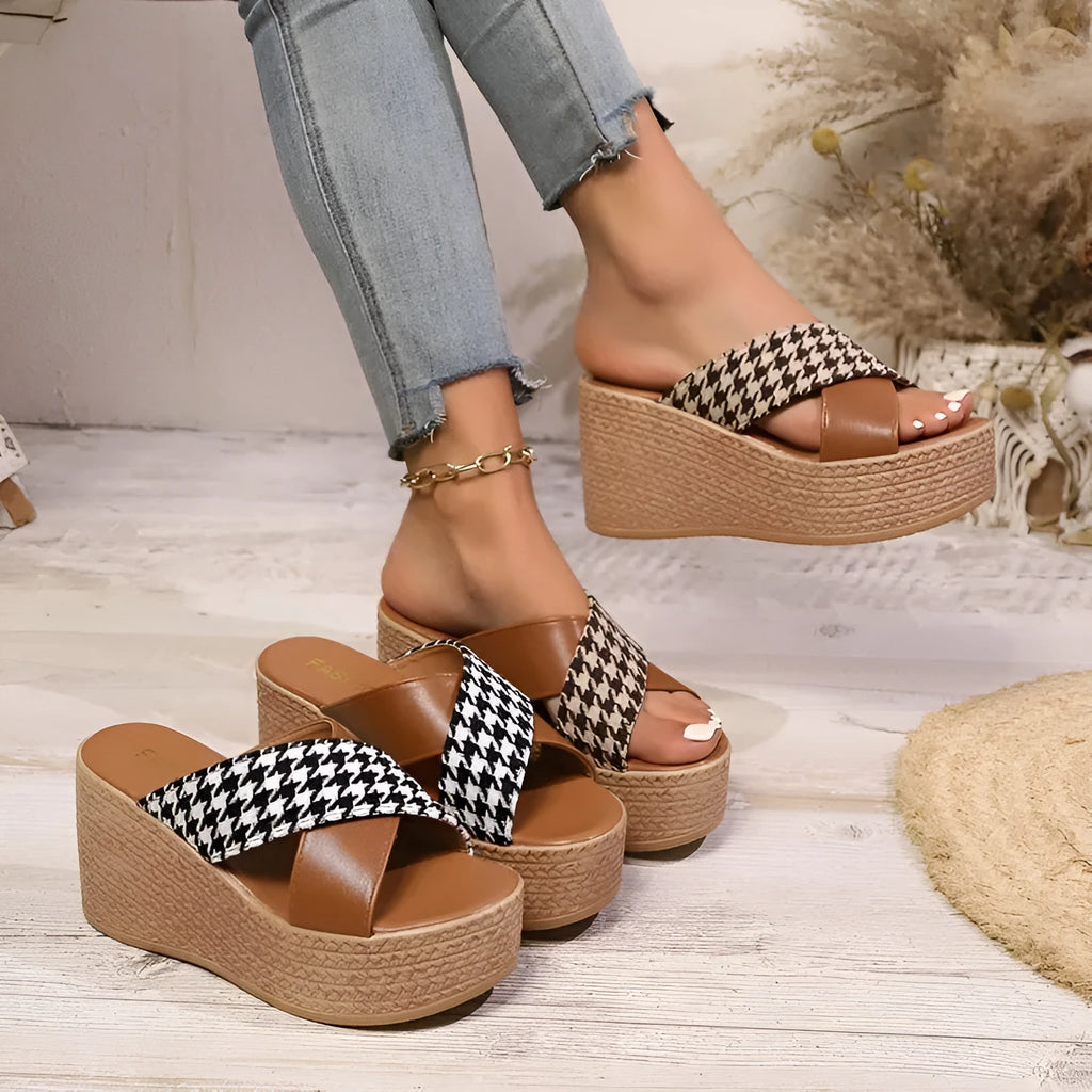 Cross leopard plaid wedge sandals in black or brown with rubber sole and plastic construction