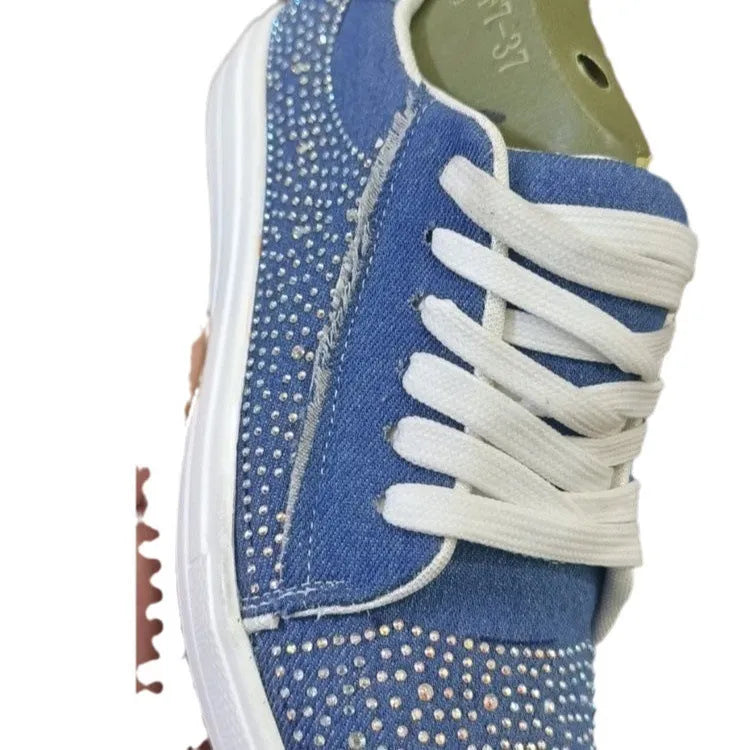 Plus size women's black lace-up casual shoes with rhinestone detail and thick rubber sole.