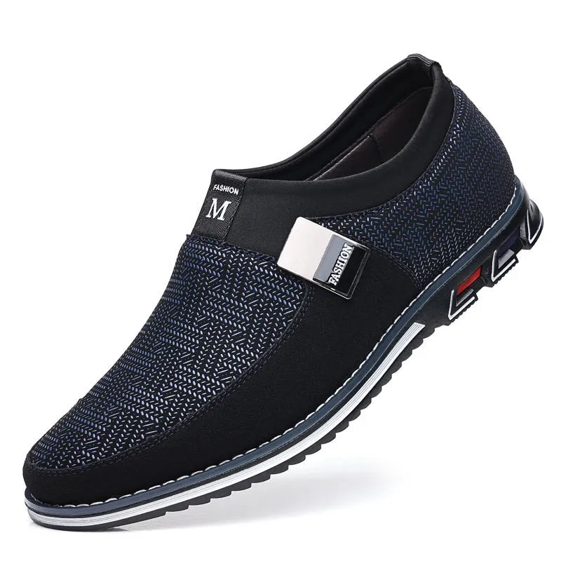 Men's grey and white synthetic leather flat casual shoes with a square toe and rubber sole.