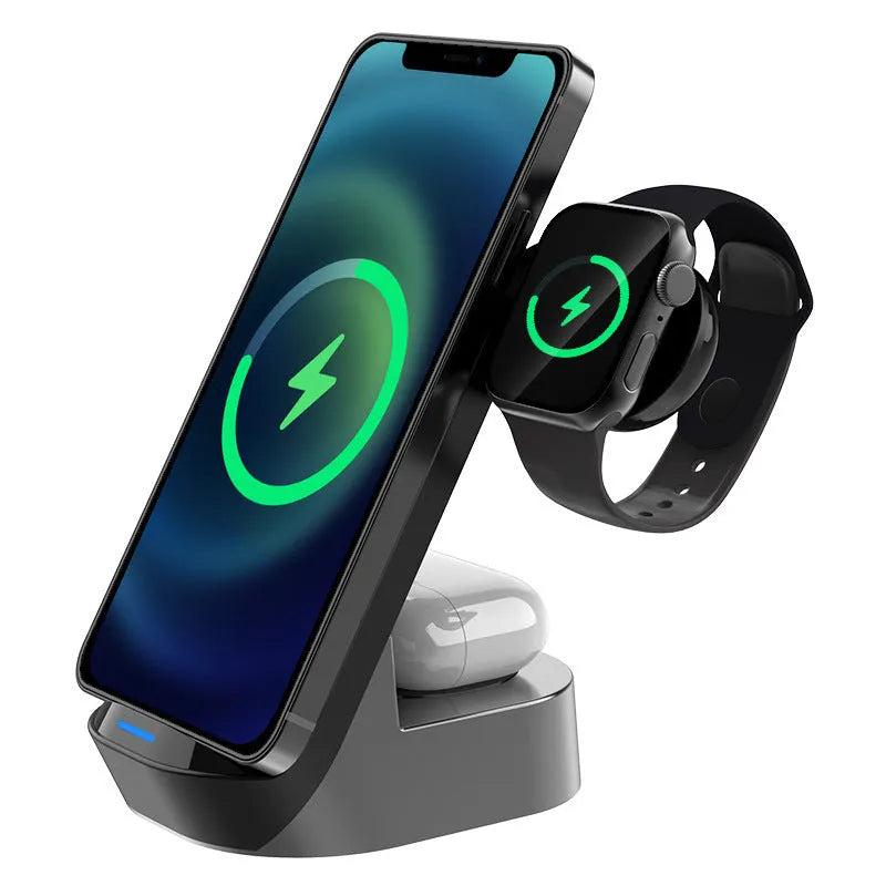 Black and grey foldable 3-in-1 wireless charging stand for phone, watch, and earbuds on a desk.