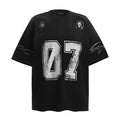Men's black and white printed short-sleeve cotton t-shirt laid flat, showing sizes S, M, L, XL.