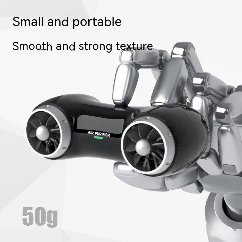 Black and white compact car air purifier and aromatherapy diffuser unit with USB Type-C cable.