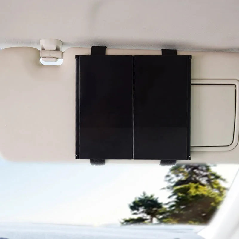 Silver car folding makeup mirror shown both closed and opened positions