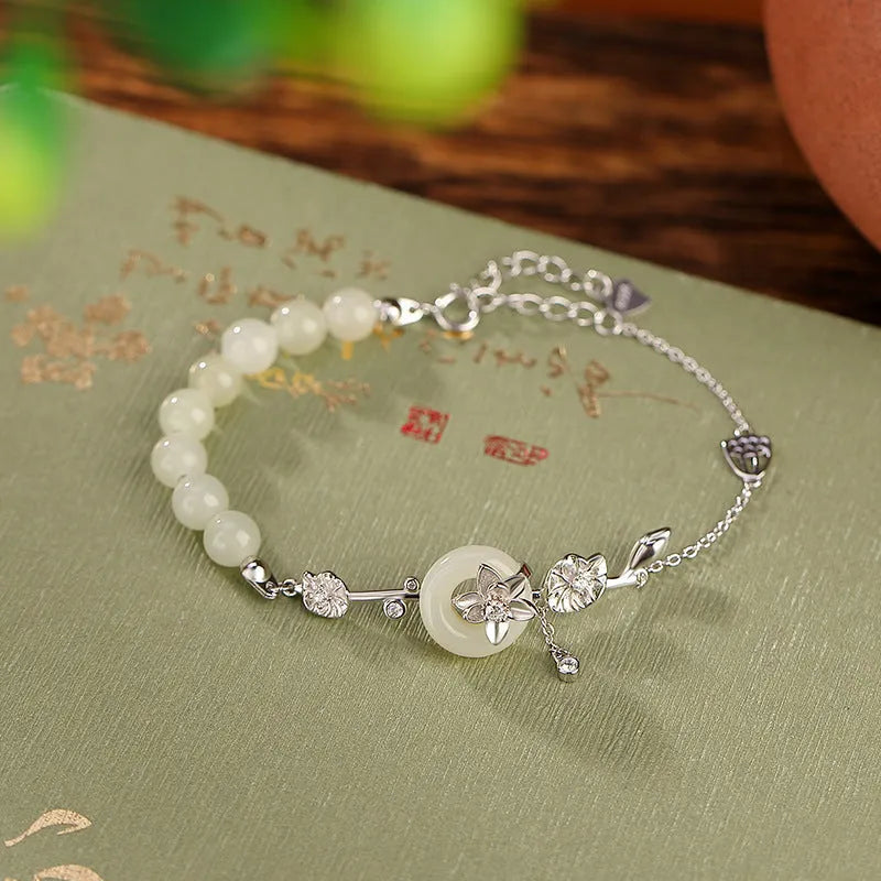 Hetian jade and 925 silver peace buckle bracelet for women in retro style.