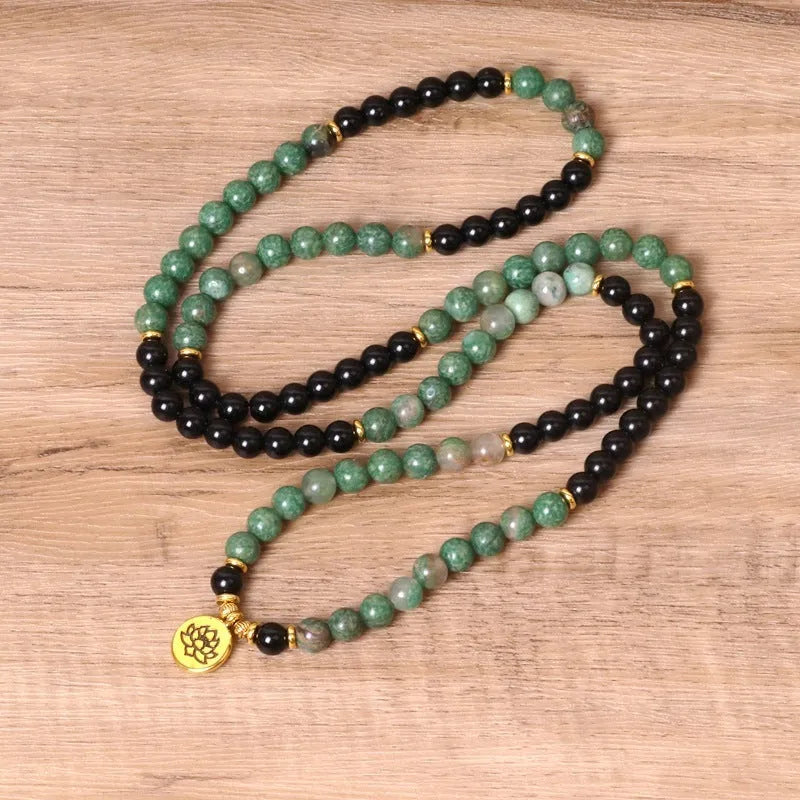 Green and black elastic beaded alloy bracelet with natural styling for wrist accessory
