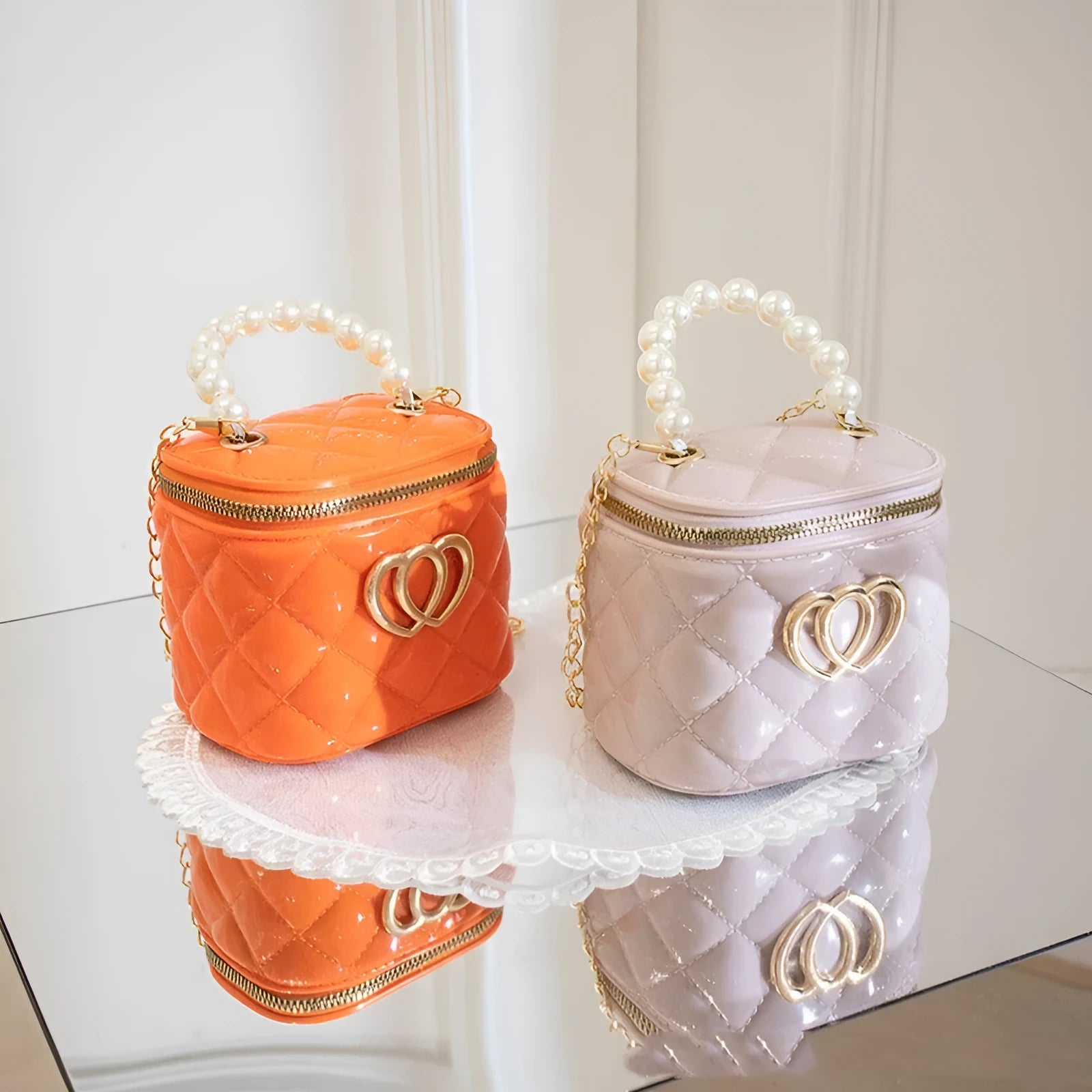 White PVC bucket bag with a heart-shaped pattern, showing its structured shape and spacious opening.