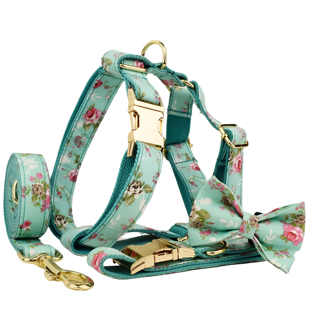 Rose print fabric dog collar set with green detachable bow, leash, and vest for pets