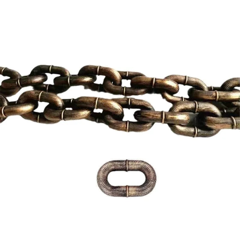 Metallic polypropylene simulation dog leash prop in bronze, silver, and black colours on a white background.