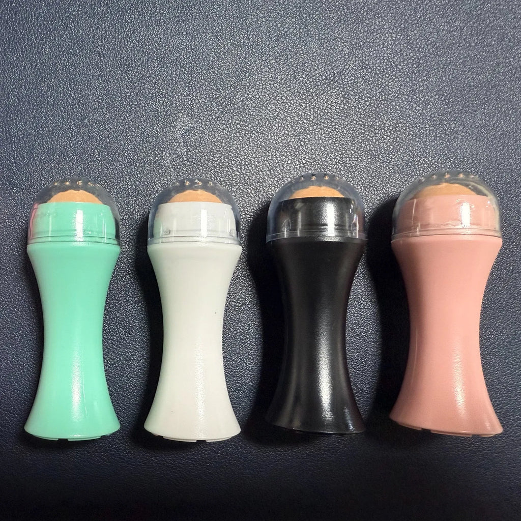 Portable volcanic stone roller for oily skin control in black, green, pink or white